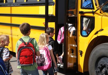 Kids on Bus to School